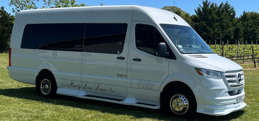 White 18-passenger Mercedes limo sprinter party bus.